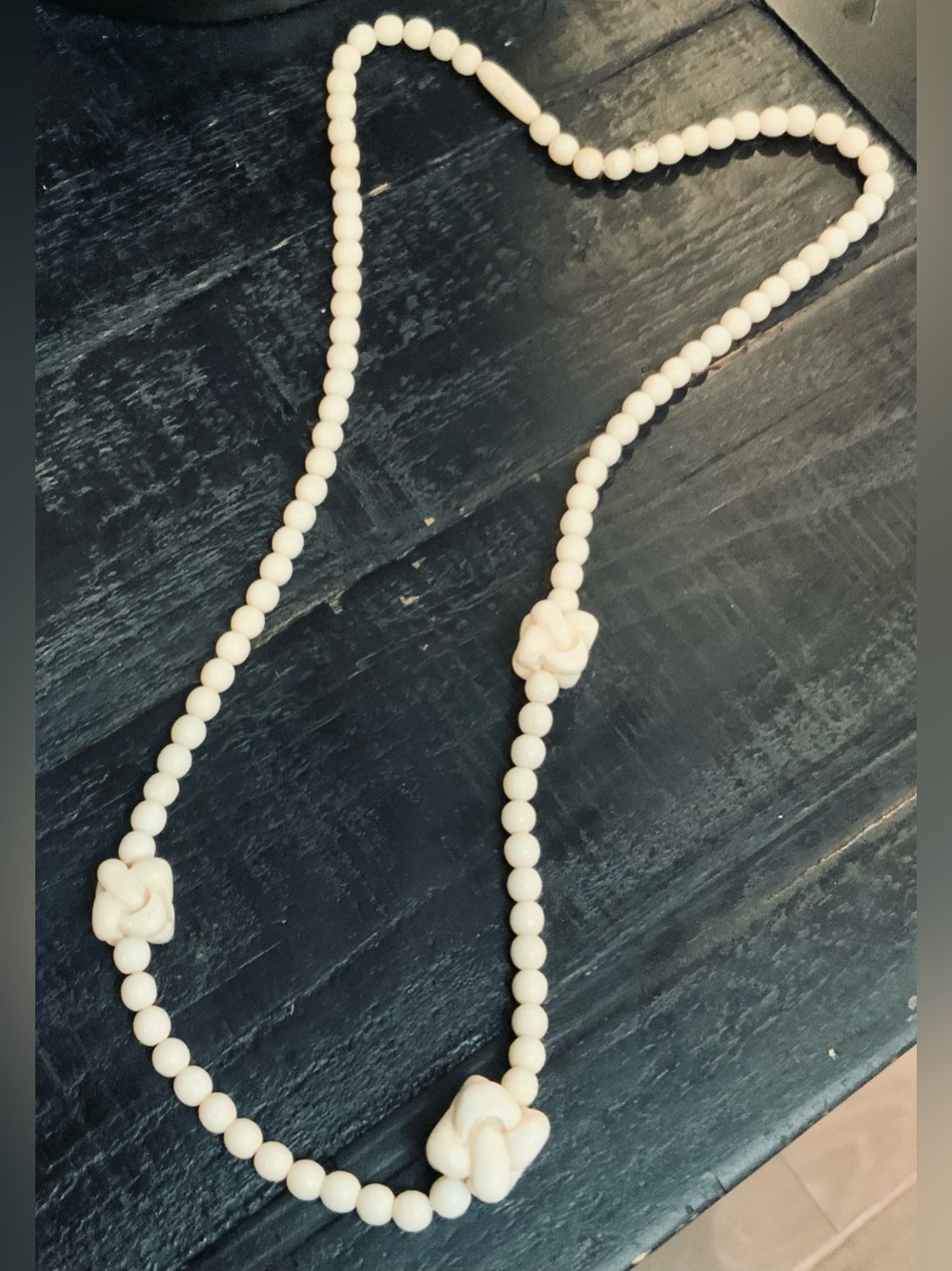 Elegant Craved Bone Beaded Necklace with 3 Knot accents